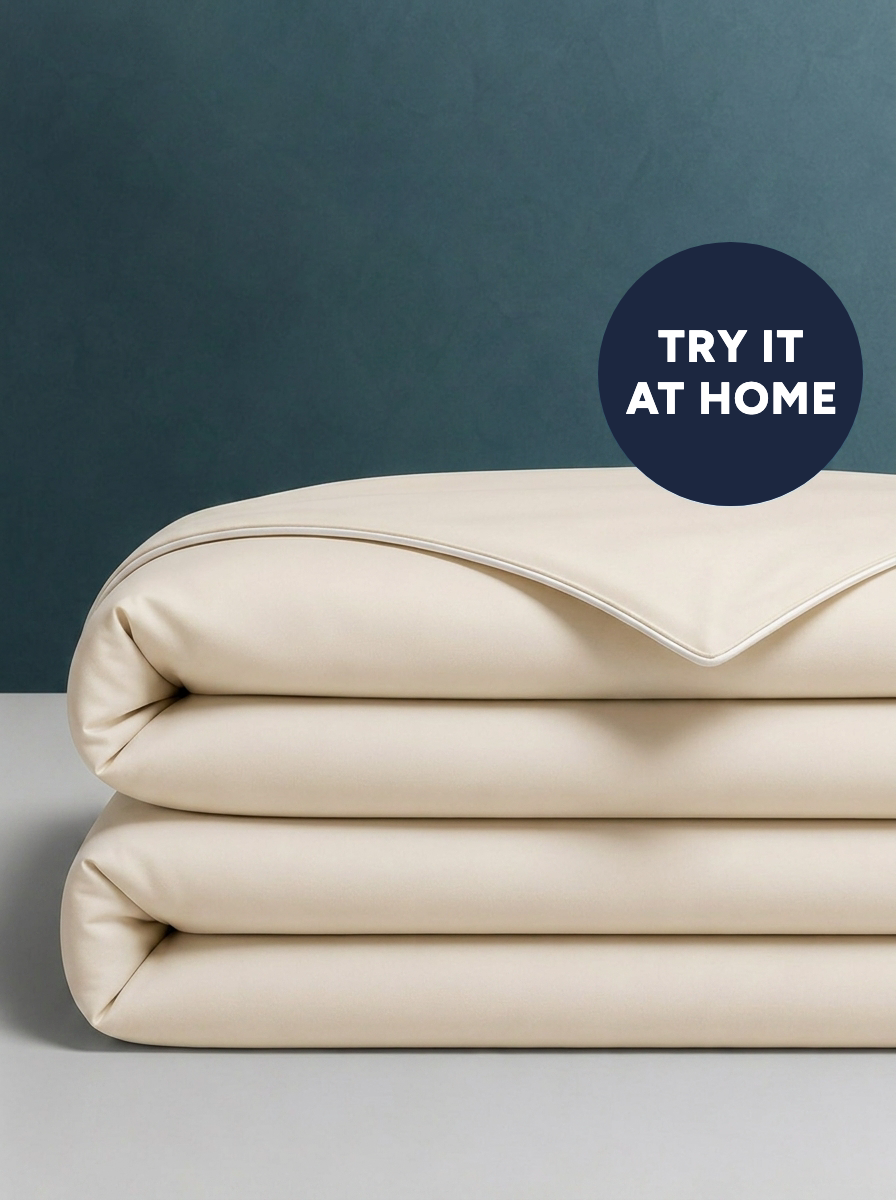 The Cooling Comforter in Frost Beige, folded · Try it at home